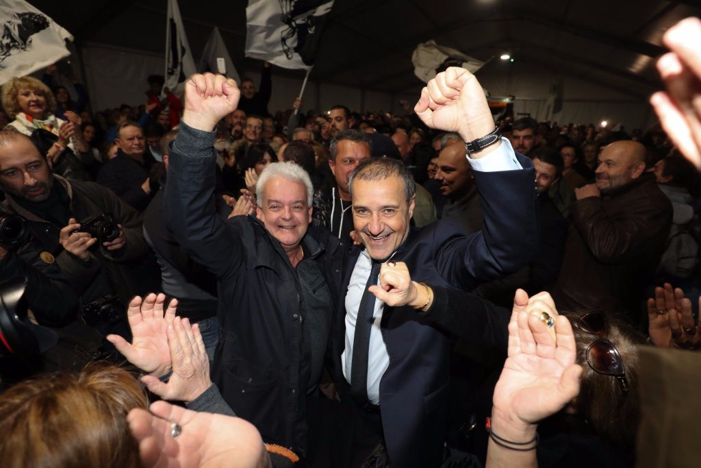 epa06382030 Nationalist leader, President of the Assembly of Corsica and candidate for the ‚Pe a Corsica‘ (lit. Pour la Corse / eng. For Corsica) nationalist list, Jean-Guy Talamoni celebrates with supporters their victory of the second round of the territorial elections on the Market square in Bastia, Corsica island, France, 10 December 2017.  EPA-EFE/OLIVIER SANCHEZ