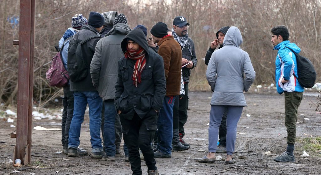 Migrants find refuge in an abandoned warehouse in Serbia