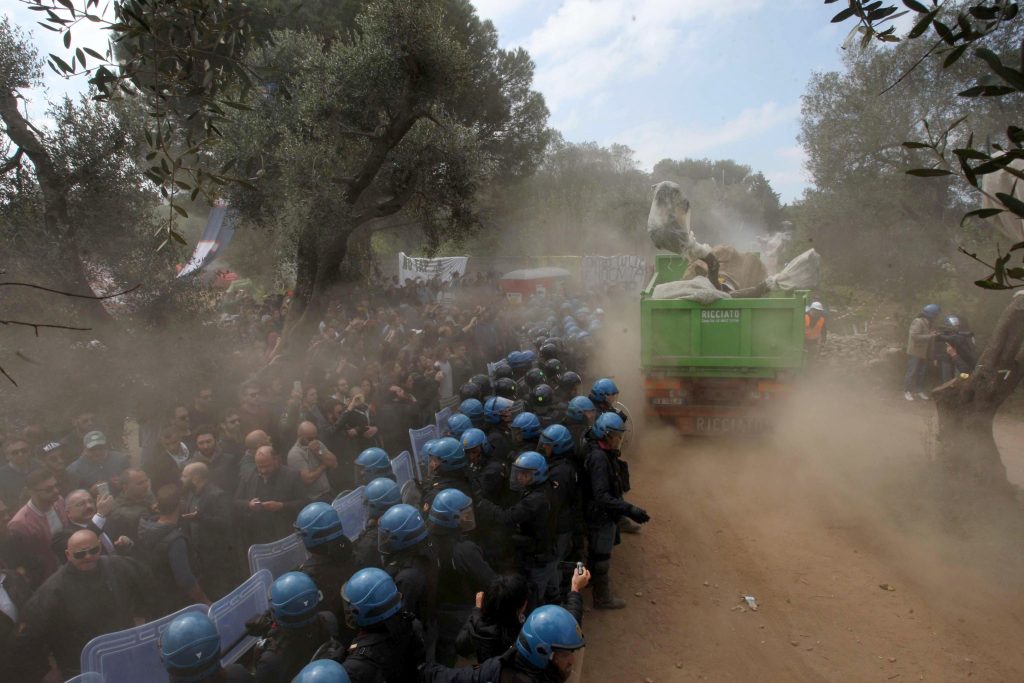 Police and protesters clash over olive trees removal near the Trans Adriatic Pipeline work site in Southern Italy