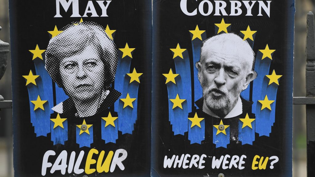 epa07482549 Posters mocking British politicians outside the Houses of Parliament in Westminster, central London, Britain, 03 April 2019. Reports state that British Prime Minister Theresa May is expected to meet Labour opposition leader Jeremy Corbyn later in the day looking for a way to to break the Brexit deadlock. May also is to ask the EU for an extension to the Brexit deadline.  EPA-EFE/FACUNDO ARRIZABALAGA
