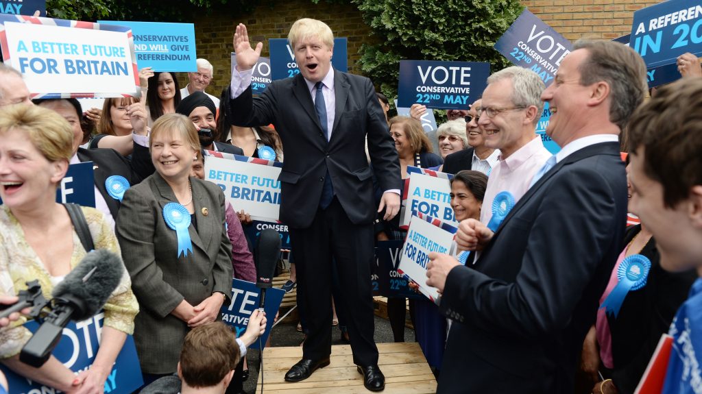 epaselect epa04217301 London Mayor Boris Johnson (C) and British Prime Minister David Cameron (R) hold an election rally ahead of European elections in Ealing, west London, Britain, 21 May 2014. The elections on 22-25 May 2014 will produce a new European Parliament, whose 751 members will help set laws in the European Union for five years to come.  EPA/ANDY RAIN