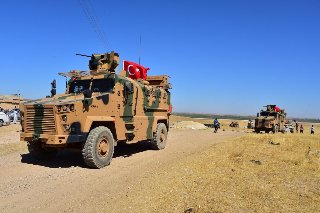 Turkish and US soldiers perform ground patrol in Northern Syria