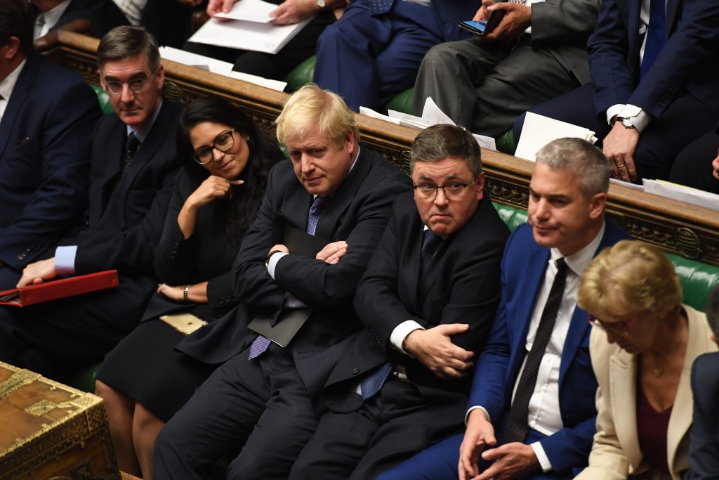 British MPs debate on Brexit summit aftermath