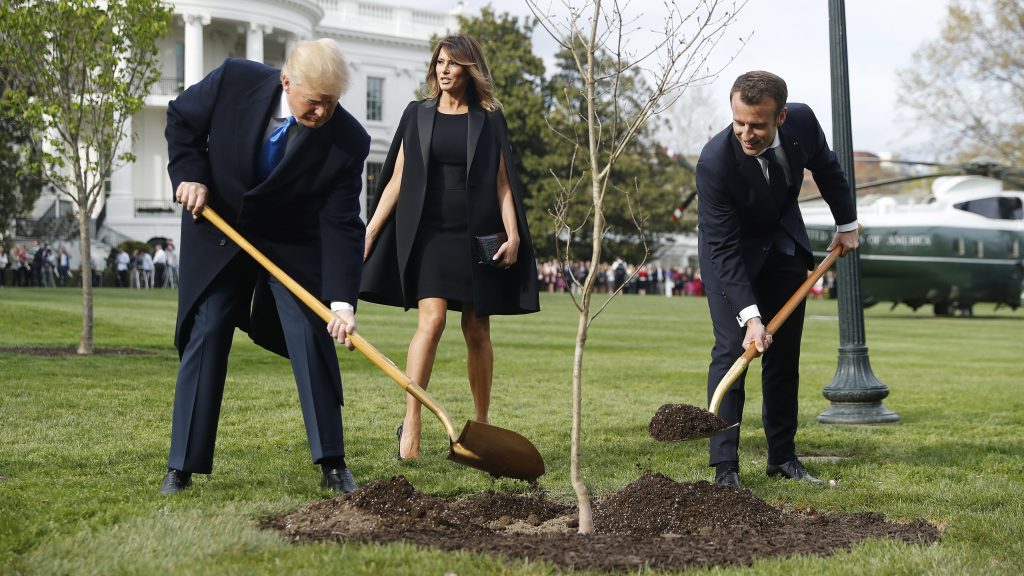 epa07643495 (FILE) – US President Donald J. Trump (L) and First Lady Melania Trump (C) with French President Emmanuel Macron (R) and his wife Brigitte Macron (not pictured) as they participate in a tree planting in front of the White House in Washington, DC, USA, 23 April 2018 (reissued on 12 June 2019). French President Macron said on 12 June 2019 that he will send a replacement tree after the friendship oak he and President Trump planted during Macron’s state visit in April 2018 died in quarentine.  EPA-EFE/SHAWN THEW