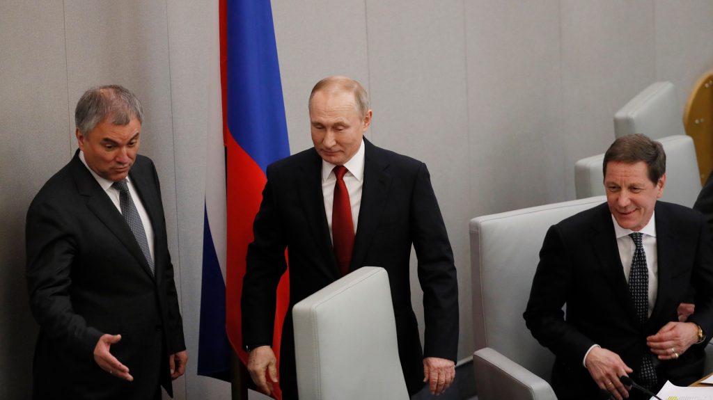 epa08283382 Russian State Duma Chairman Vyacheslav Volodin (L), Russian President Vladimir Putin (C) and First Deputy Chairman of the State Duma Alexander Zhukov (R) attend a plenary session of the Russian State Duma in Moscow, Russia, 10 March 2020. The State Duma approved amendments to the Russia’s Constitution in the 2nd reading.  EPA-EFE/YURI KOCHETKOV