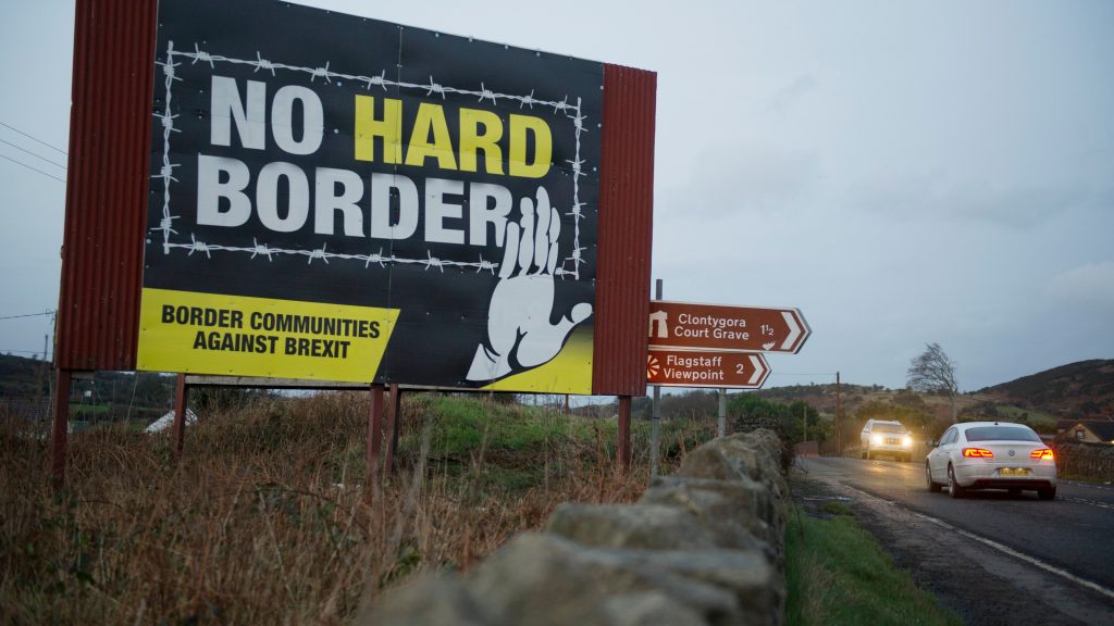 epa08182631 An no hard border poster is pictured on the Irish border in Newry in Northern Ireland, Britain, 31 January 2020. Britain officially exits the EU on 31 January 2020, beginning an eleven month transition period.  EPA-EFE/AIDAN CRAWLEY
