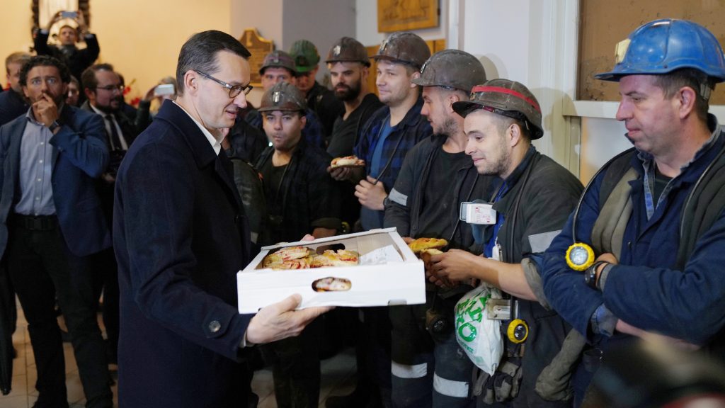 epa07912790 Polish Prime Minister Mateusz Morawiecki (L) attends his meeting with miners at the Staszic coal mine during the ruling Law and Justice party’s election campaign in Katowice, Poland, 11 October 2019. An average of eleven candidates are running for each Sejm (lower house) seat in the national elections planned for 13 October 2019. In total, 5,114 people are running for 460 seats. Some 278 people are running for the Senate (upper house), three candidatures for each seat.  EPA-EFE/Andrzej Grygiel POLAND OUT
