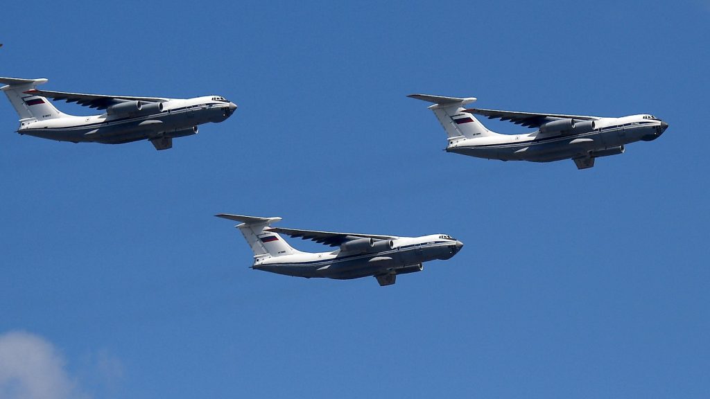 epa08505856 Russian Ilyushin Il-76 transport planes fly over Moscow during the military parade to commemorate the 75th anniversary of Victory in World War Ii, in Moscow, Russia, 24 June 2020. The military parade marking the 75th anniversary of the victory over Nazi Germany in the World War II takes place in the Red Square on 24 June 2020, as the traditional troops parade as part of the Victory Day Parade which is annually held on 09 May, was cancelled due to Covid-19 epidemic in Russia.  EPA-EFE/NINA ZOTINA / HOST PHOTO AGENCY / POOL MANDATORY CREDIT