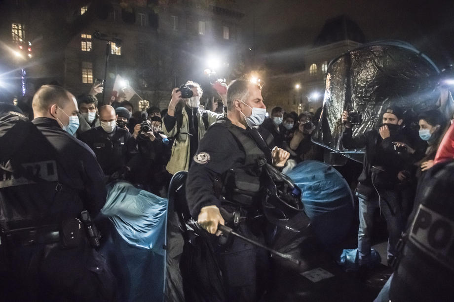 Migrants install tents at Republic Square in Paris