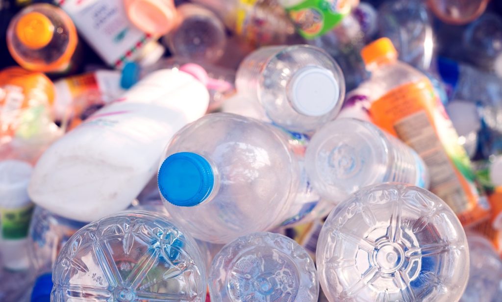 Plastic,Bottle,In,Recycle,Bin,waste,Management,Concept.