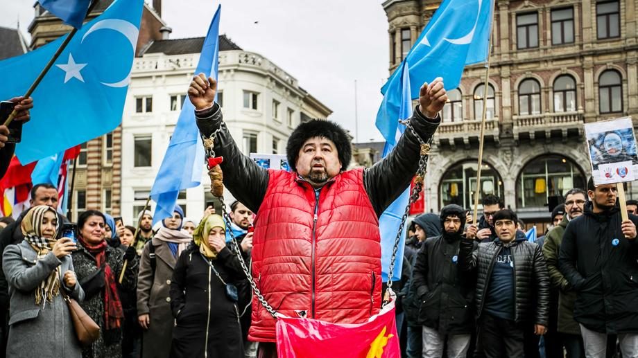 Members of the Uighur community in Amsterdam protest