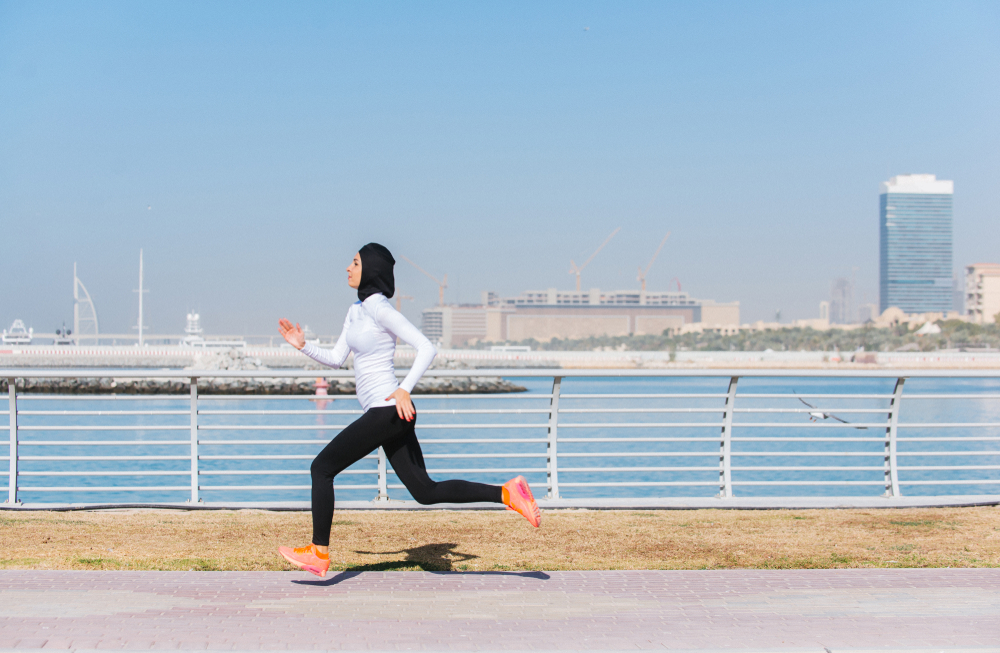 Arabic,Woman,Running,Outdoor,And,Wearing,Hijab