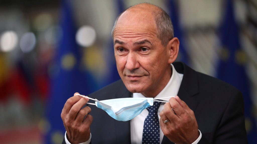 epa08551184 Slovenia’s Prime Minister Janez Jansa takes his face mask off as he arrives for a European Union Council in Brussels, Belgium, 17 July 2020. European Union nations leaders meet face-to-face for the first time since February to discuss plans responding to coronavirus crisis and new long-term EU budget at the special European Council on 17 and 18 July.  EPA-EFE/FRANCISCO SECO / POOL