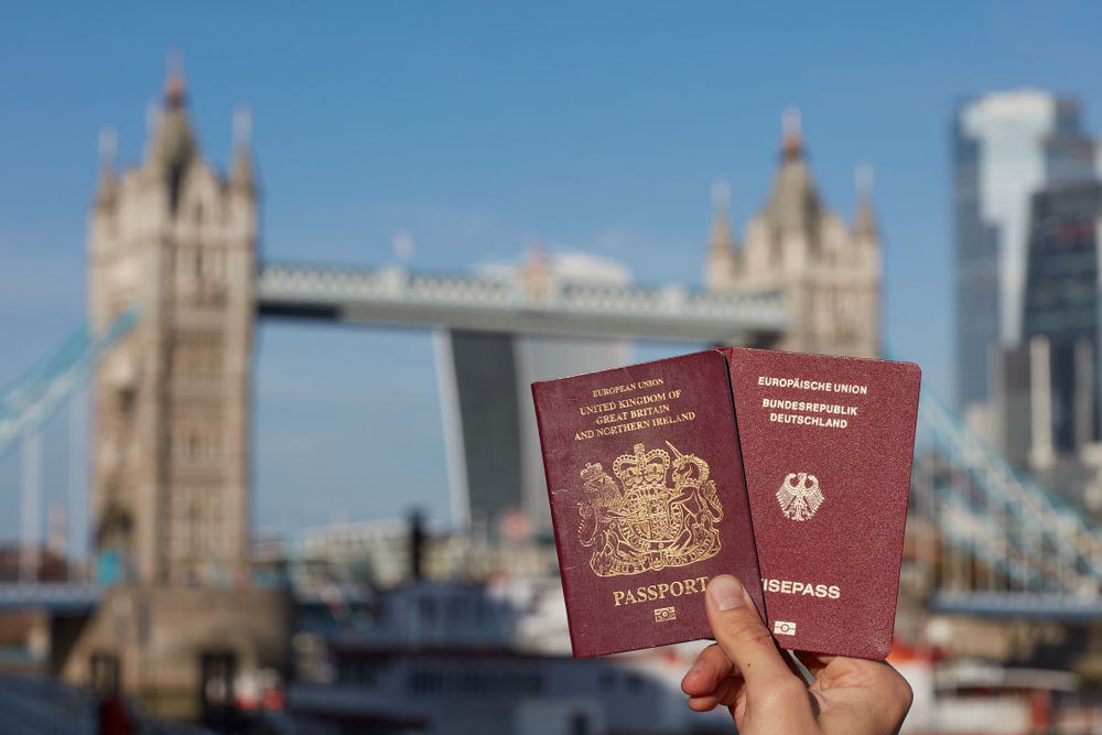 British,Passport,Held,Along,With,Other,Eu,Passport,Against,London