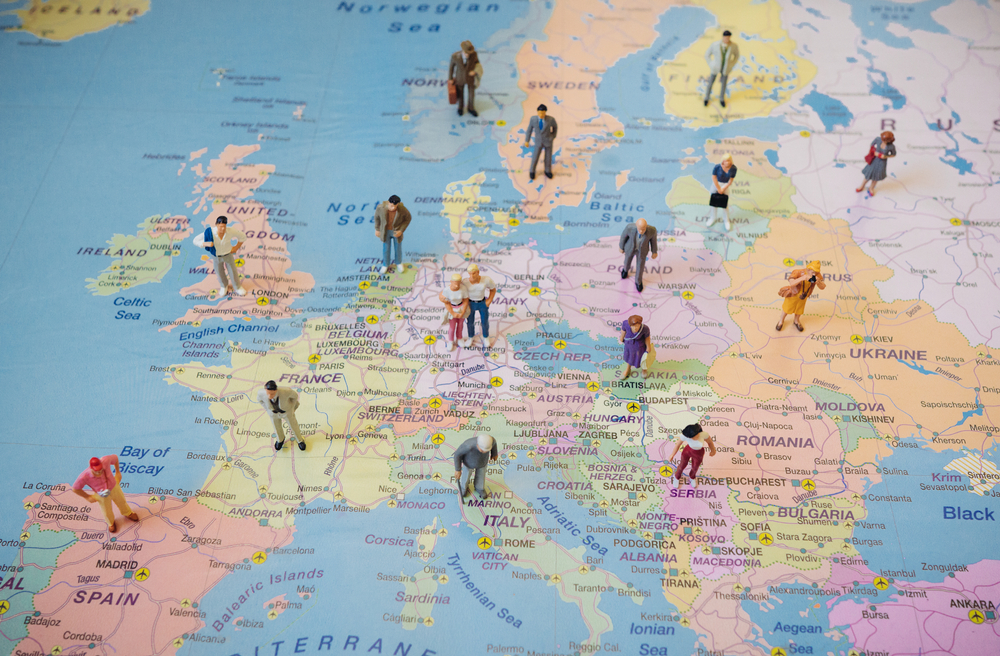Many,Figures,Of,People,Are,Placed,On,Europe,Map.,Open
