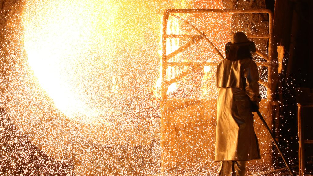 epa07415117 A steel worker cleans a smelter at the Salzgitter AG steel works in Salzgitter, northern Germany, 05 March 2019. With about 25,000 employees worldwide, the Salzgitter AG generated a business volume of nearly nine billion Euros in 2017.  EPA-EFE/FOCKE STRANGMANN