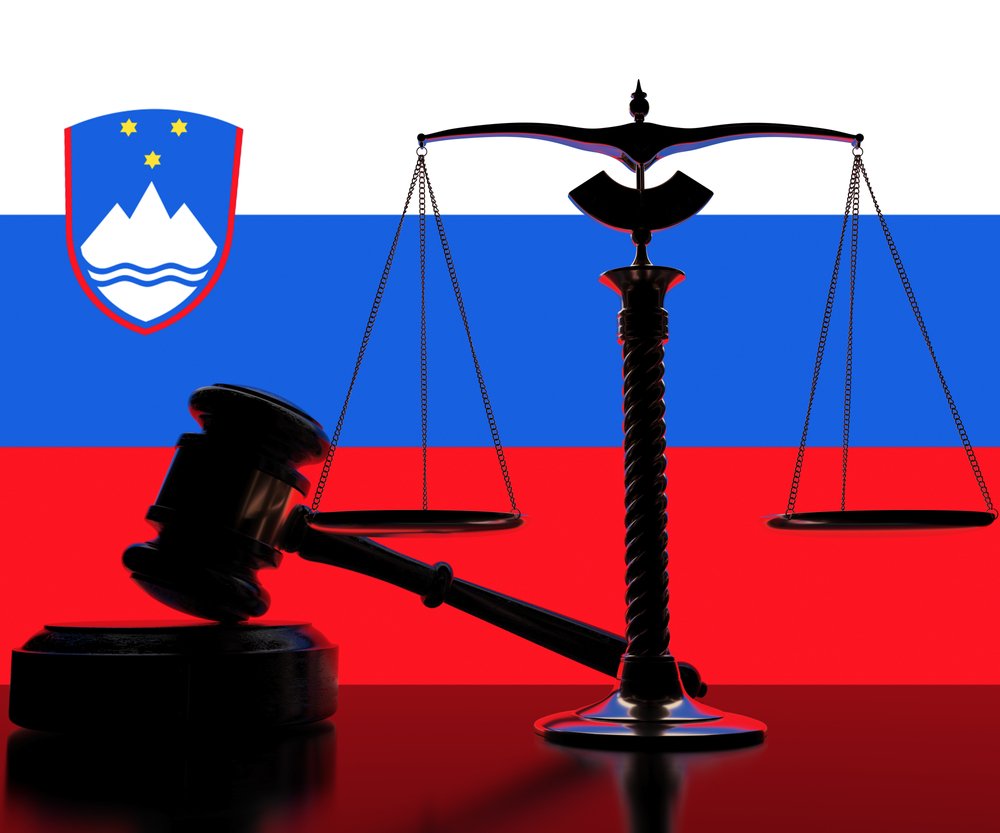 Flag,Of,Slovenia,Behind,Court,Gavel,And,Scales.,3d,Rendering
