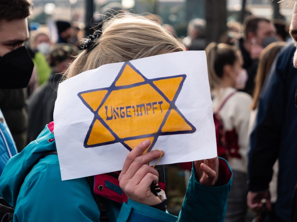 Vienna,,Austria,-,November,20,2021:,Anti-vax,Covid-19,Demonstrator,Holding