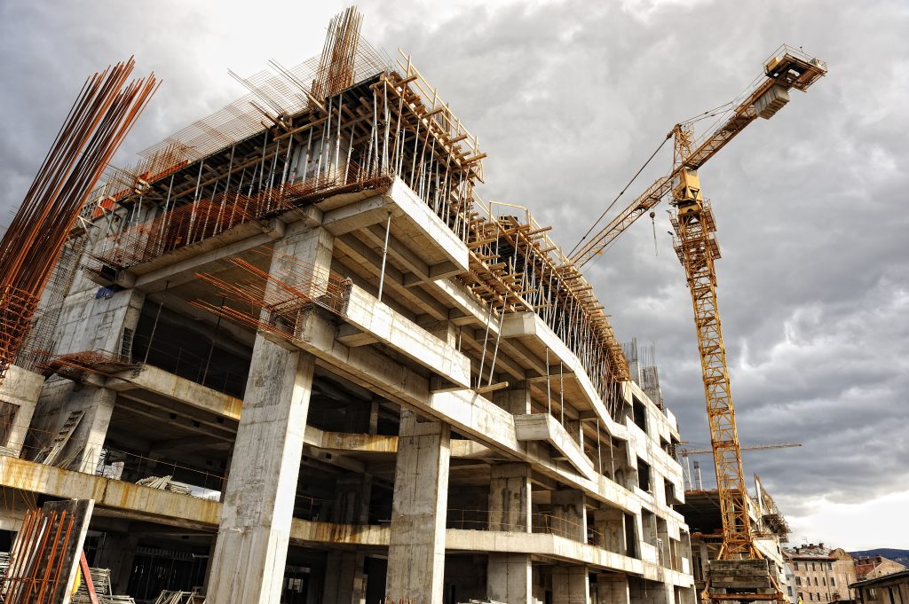 Construction,Site,With,Crane,And,Building
