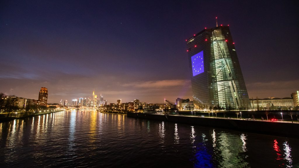 epa09666101 The European Central Bank (ECB) headquarters is illuminated with various motifs to mark the 20th anniversary of the euro in Frankfurt am Main, Germany, 01 January 2022 (issued 04 January 2022). The light show was launched on 01 January and will illuminate the ECB headquarters in the evening for the first ten days of the month.  EPA-EFE/CONSTANTIN ZINN
