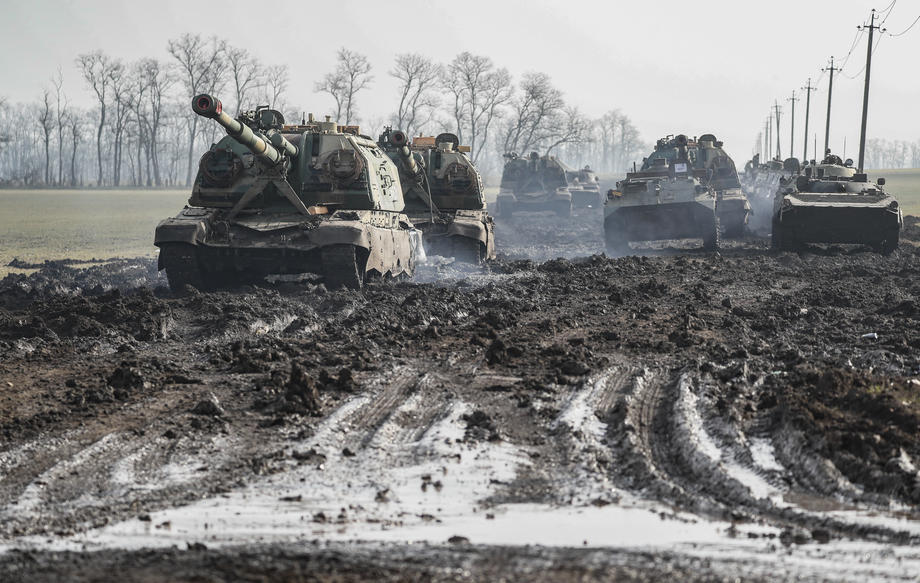 Russian armoured vehicles stand on the road in Rostov region