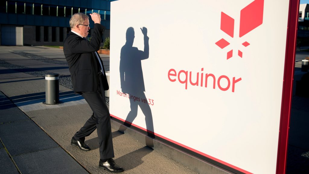 epa08562928 (FILE) – Eldar Saetre, the CEO of Norwegian natural gas and oil company Equinor, looks at his own shadow cast on an equinor sign after the presentation of the company’s Q3 results, outside their headquarters in Fornebu, Norway, 25 October 2018 reissued 23 July 2020). Equinor, previously named Statoil, is due to release their 2nd quarter 2020 results on 24 July 2020.  EPA-EFE/VIDAR RUUD NORWAY OUT