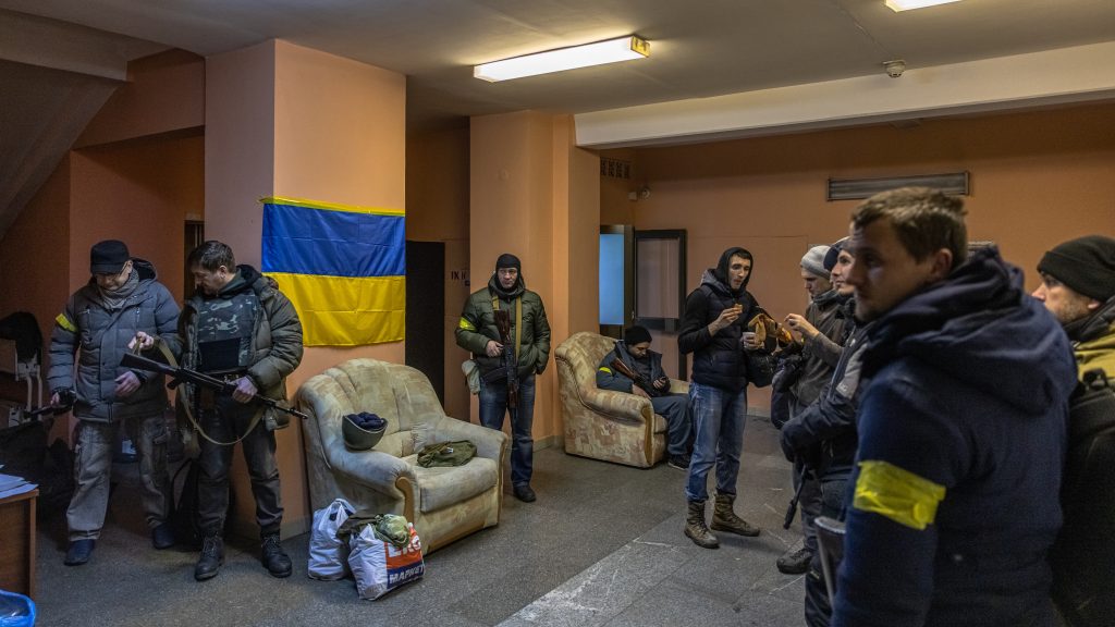 epa09797267 Members of Ukrainian Territorial Defense Forces gather inside their base, in Kyiv (Kiev), Ukraine, 02 March 2022. Russian troops entered Ukraine on 24 February prompting the country’s president to declare martial law and triggering a series of severe economic sanctions imposed by Western countries on Russia.  EPA-EFE/ROMAN PILIPEY