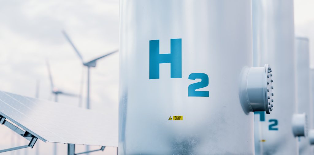 Hydrogen,Energy,Storage,Gas,Tank,With,Solar,Panels,And,Wind