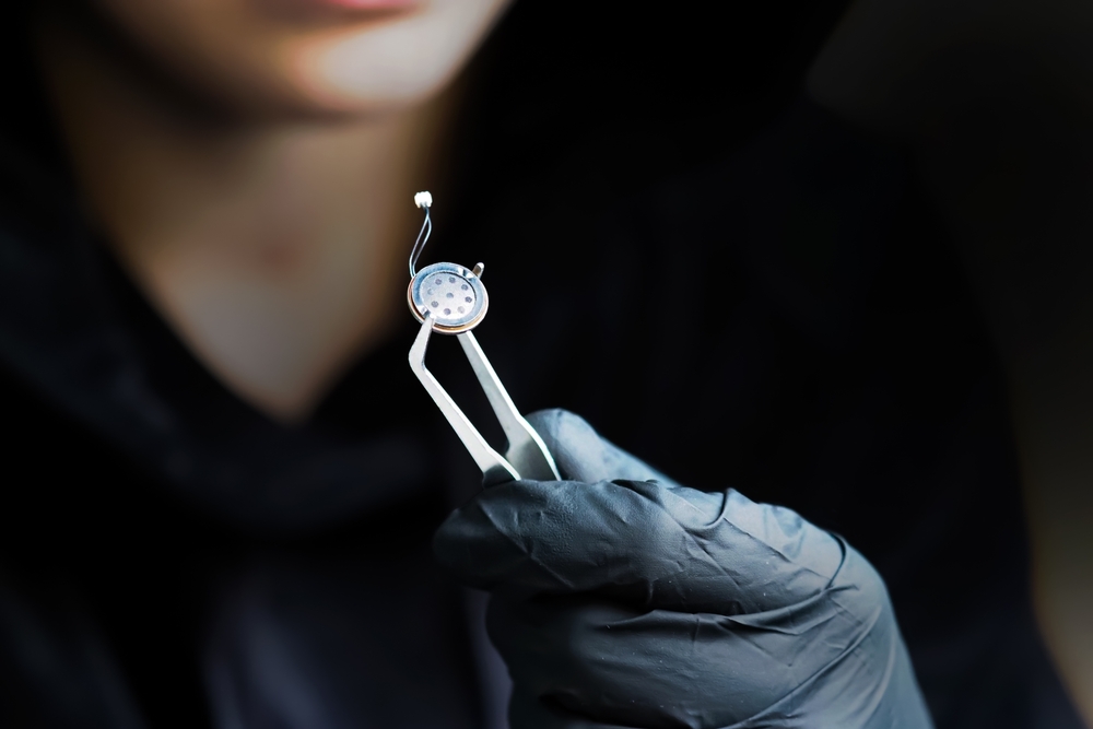 Spy,Games.,Small,Microphone,Of,The,Overhearing,Device,,Spy,Holding