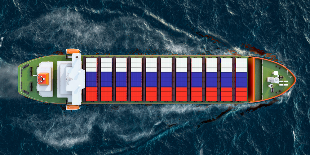 Freighter,Ship,With,Russian,Cargo,Containers,Sailing,In,Ocean,,3d