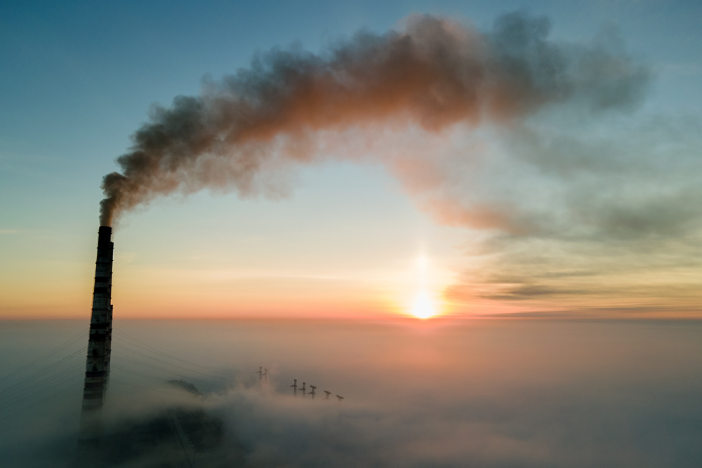 Aerial,View,Of,Coal,Power,Plant,High,Pipes,With,Black
