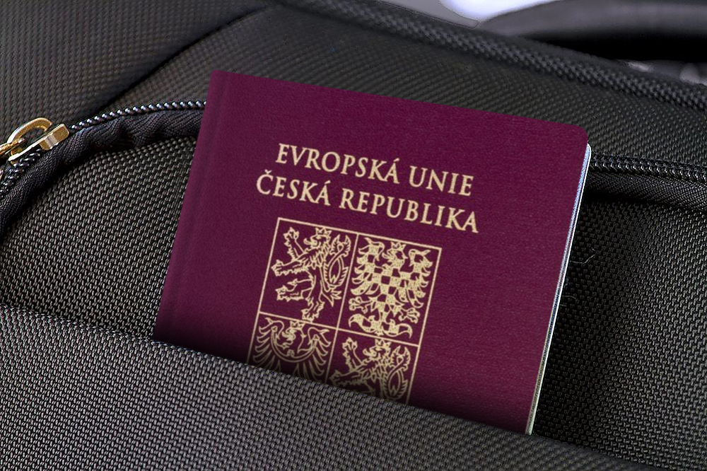 Close,Up,Of,Czech,Republic,Passport,In,Black,Suitcase,Pocket