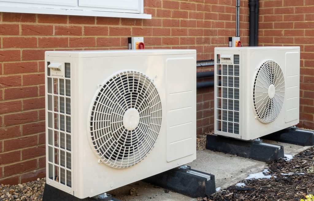 Two,Air,Source,Heat,Pumps,Installed,On,The,Exterior,Of