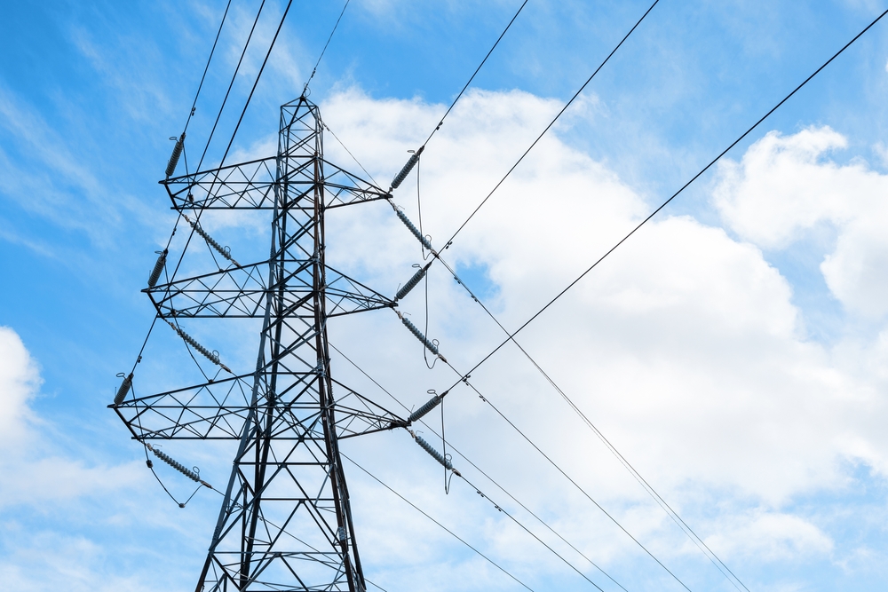 Detail,Of,A,British,Style,Electricity,Pylon,And,Suspended,Electic