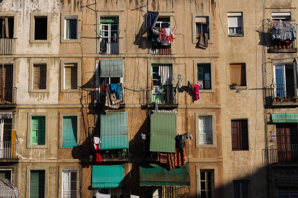 View,Of,Slum,Apartments,With,Blinds,And,Balconies,In,The