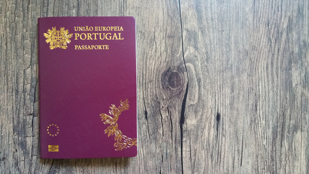 Portuguese,Passport,On,Wooden,Background