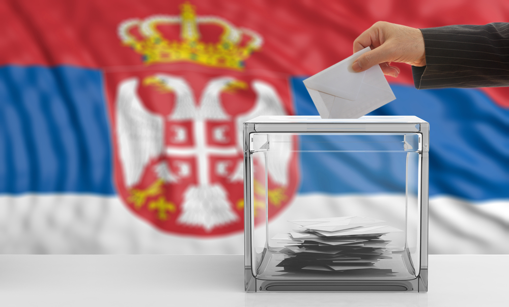 Serbia,Elections.,Voter,And,A,Ballot,Box,On,Serbia,Flag
