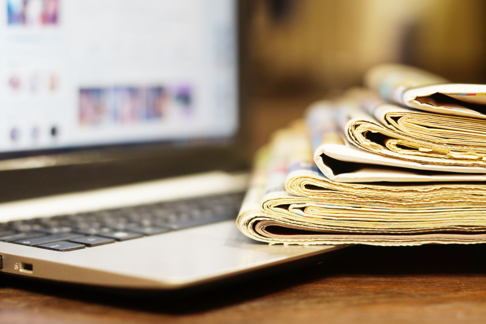 Newspapers,And,Laptop.,Different,Concepts,For,News,-,Social,Network