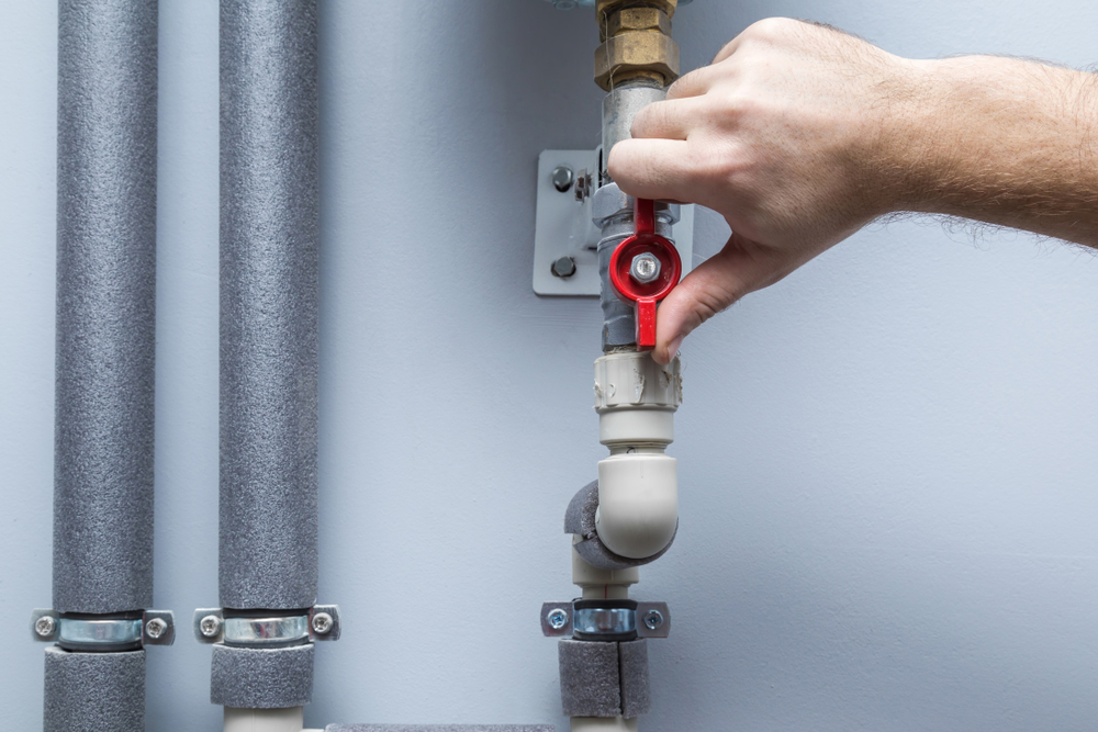 Man,Working,At,Pipes.,Turning,On,Or,Turning,Off,Water
