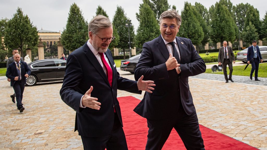 epa10056778 Czech Prime Minister Petr Fiala (L) welcomes Croatian Prime Minister Andrej Plenkovic (R) before their talks in Prague, Czech Republic, 07 July 2022.  EPA-EFE/MARTIN DIVISEK