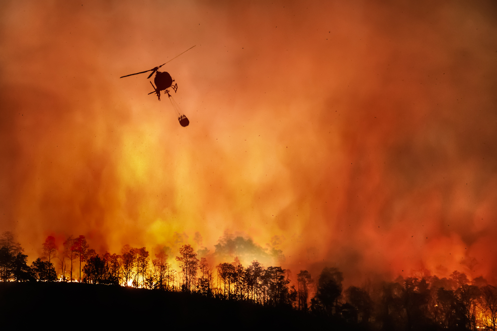 Fire,Fighting,Helicopter,Carry,Water,Bucket,To,Extinguish,The,Forest