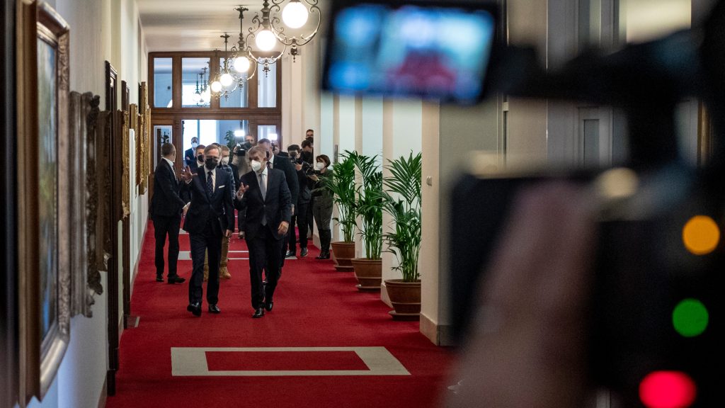 epa09646542 Outgoing Prime Minister Andrej Babis (R) walks with new Czech Prime Minister Petr Fiala (R), the leader of the Civic Democratic Party (ODS), before the first cabinet meeting at the Straka Academy, the Office of the Czech Government, in Prague, Czech Republic, 17 December 2021. Czech President Milos Zeman appointed new government on 17 December at Chateau Lany following October’s parliamentary election. A coalition of Civic Party (ODS), KDU-CSL, TOP 09 Party, Pirates Party and STAN Party forms the new Czech government.  EPA-EFE/MARTIN DIVISEK