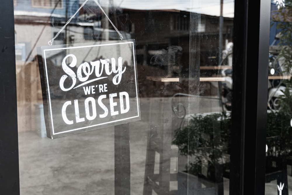 Sorry,We’re,Closed,Sign.,Grunge,Image,Hanging,On,A,Dirty