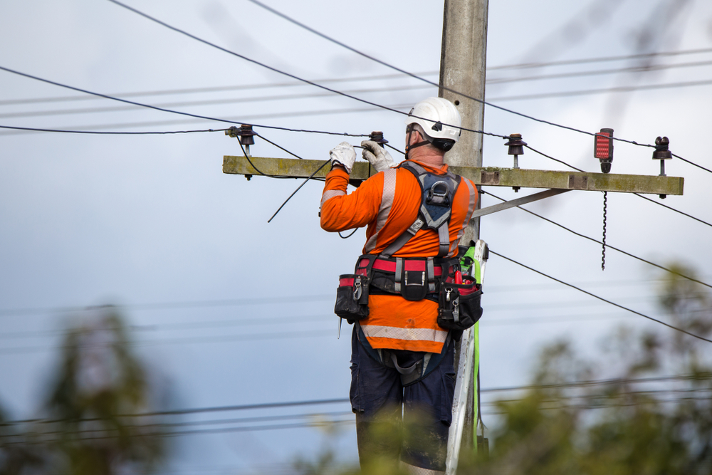 A,Linesman,With,A,Power,Company,Connects,A,New,House