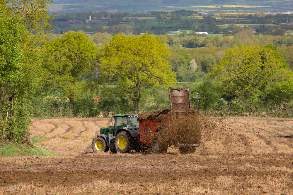 Goult,,Normandy,,France,-,April,23,,2018:,A,Farmer,Using