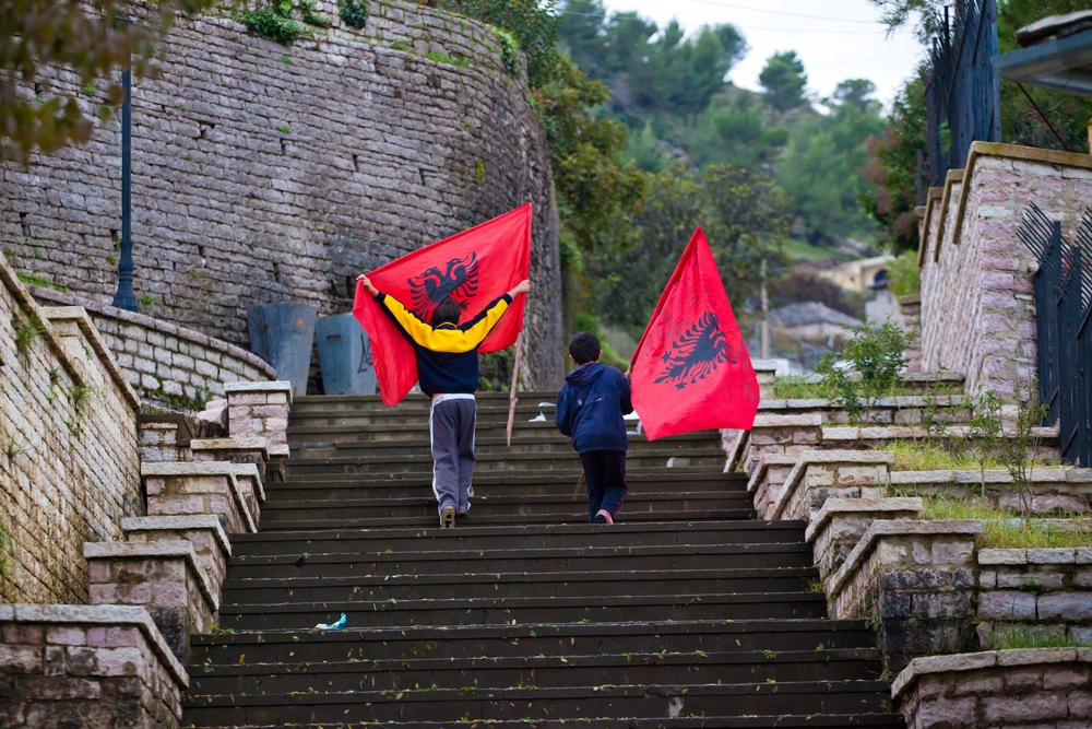 Gjirokaster,,Albania,-,October,27:,Unidentified,Local,Boys,Run,Up