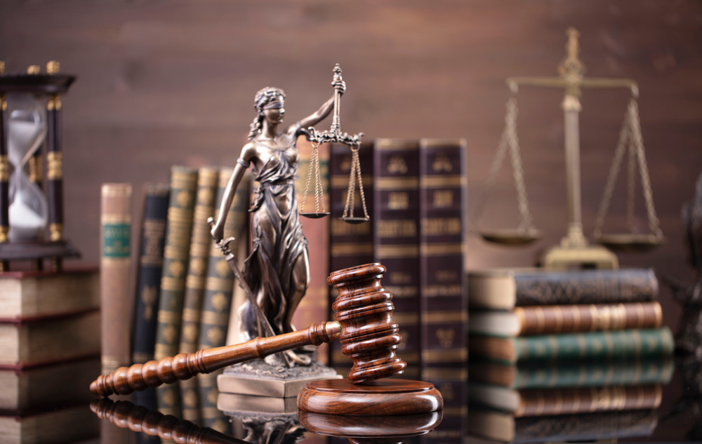 Law,Code,Concept,Background.,Justice,Symbols,On,Glossy,Table.
