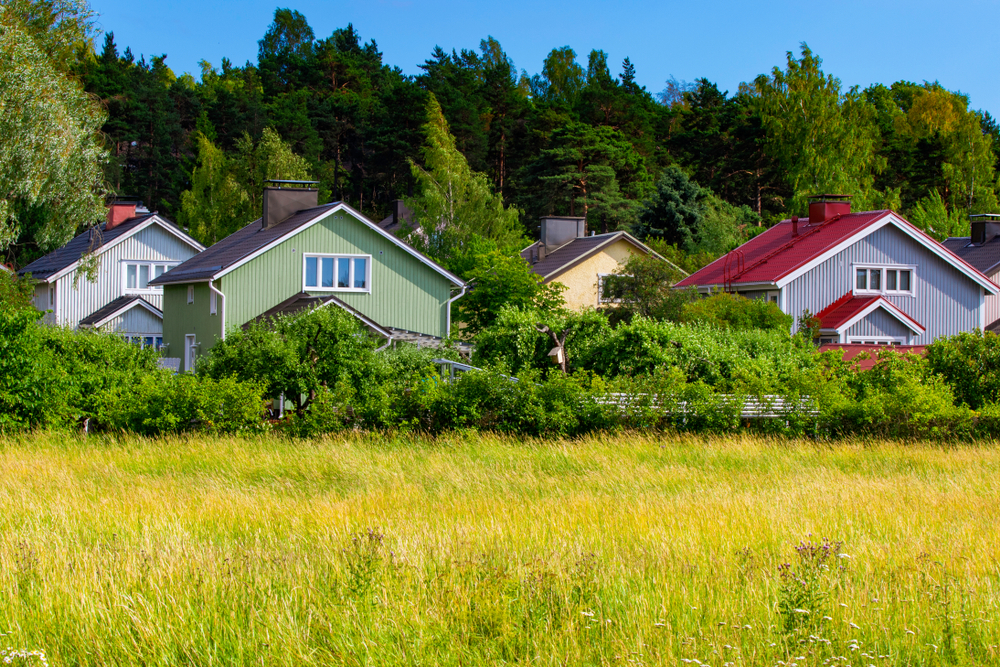 Colorful,Wooden,Homes,Nestled,Among,Lots,Of,Greenery,In,A