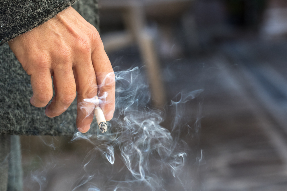 Hand,With,Burning,Cigarette