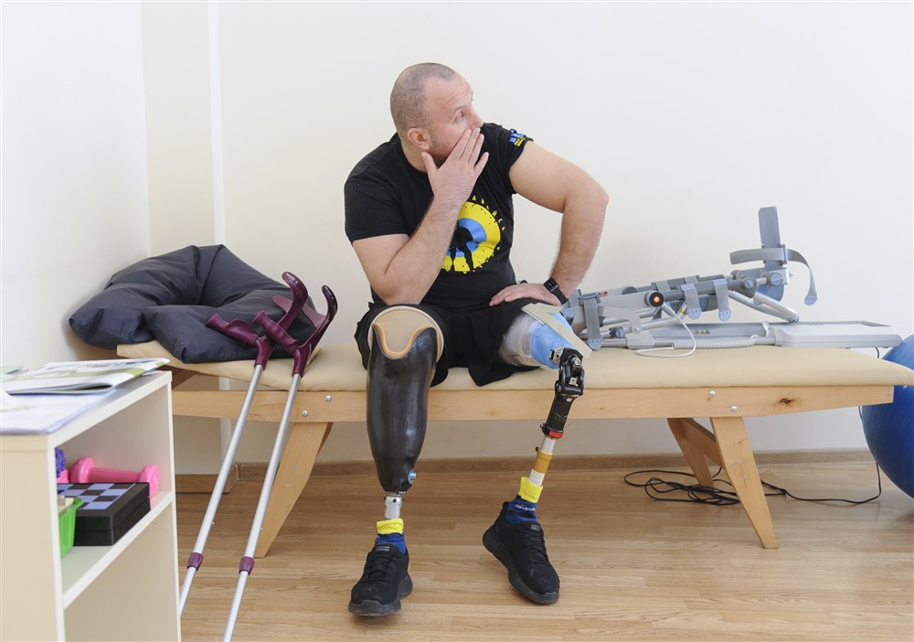 Wounded Ukrainian servicemen recover from injuries at rehabilitation center near Lviv